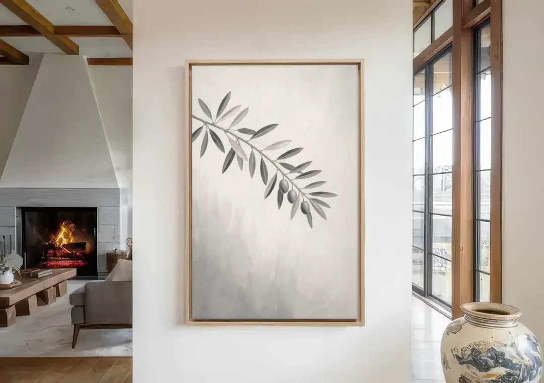 Botanical Paintings Olive Branch in Soft Grey canvas wall art in a living room with a fireplace