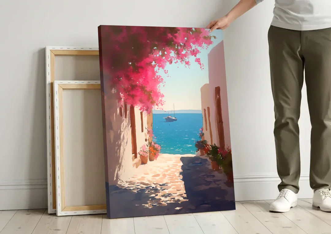 Bougainvillea Painting of a Seaside Lane canvas wall art leaning against a wall next to blank canvases