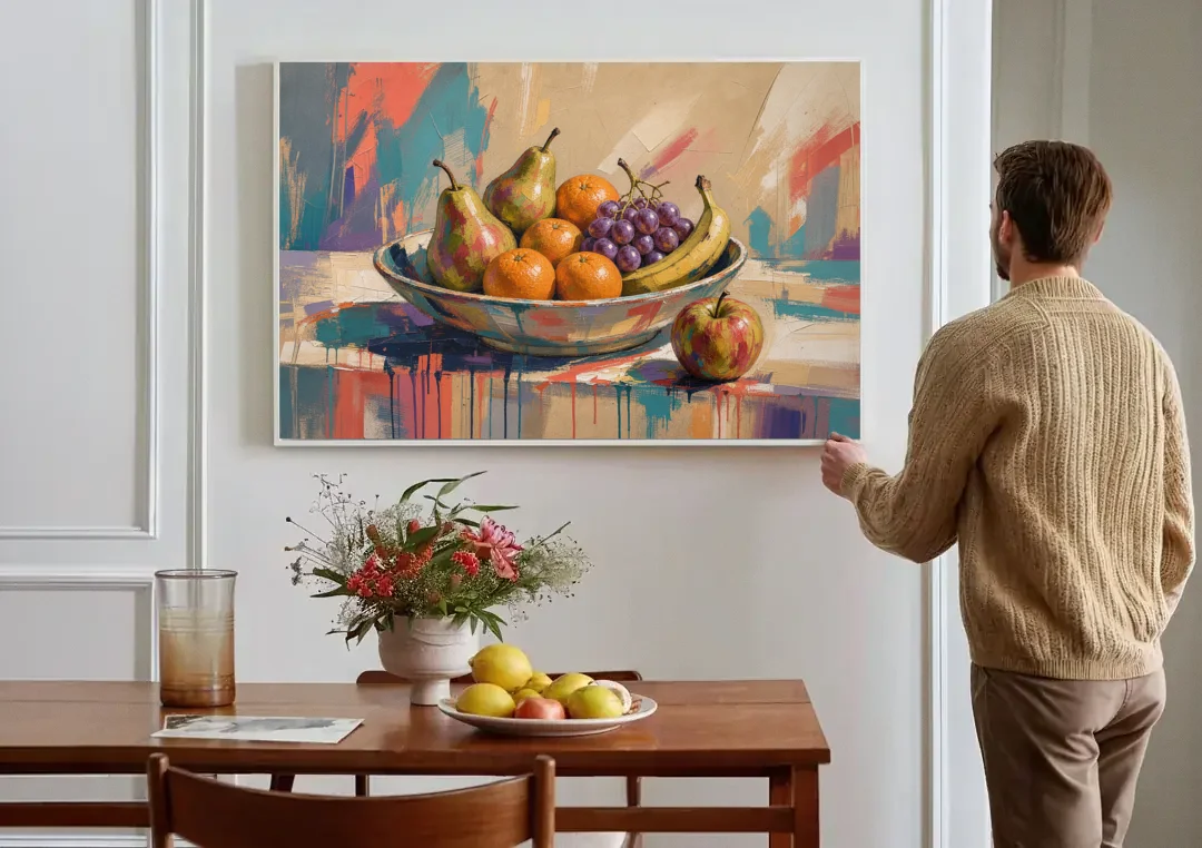 Bowl of Fruit Painting with Runaway Apple canvas wall art above a dining table