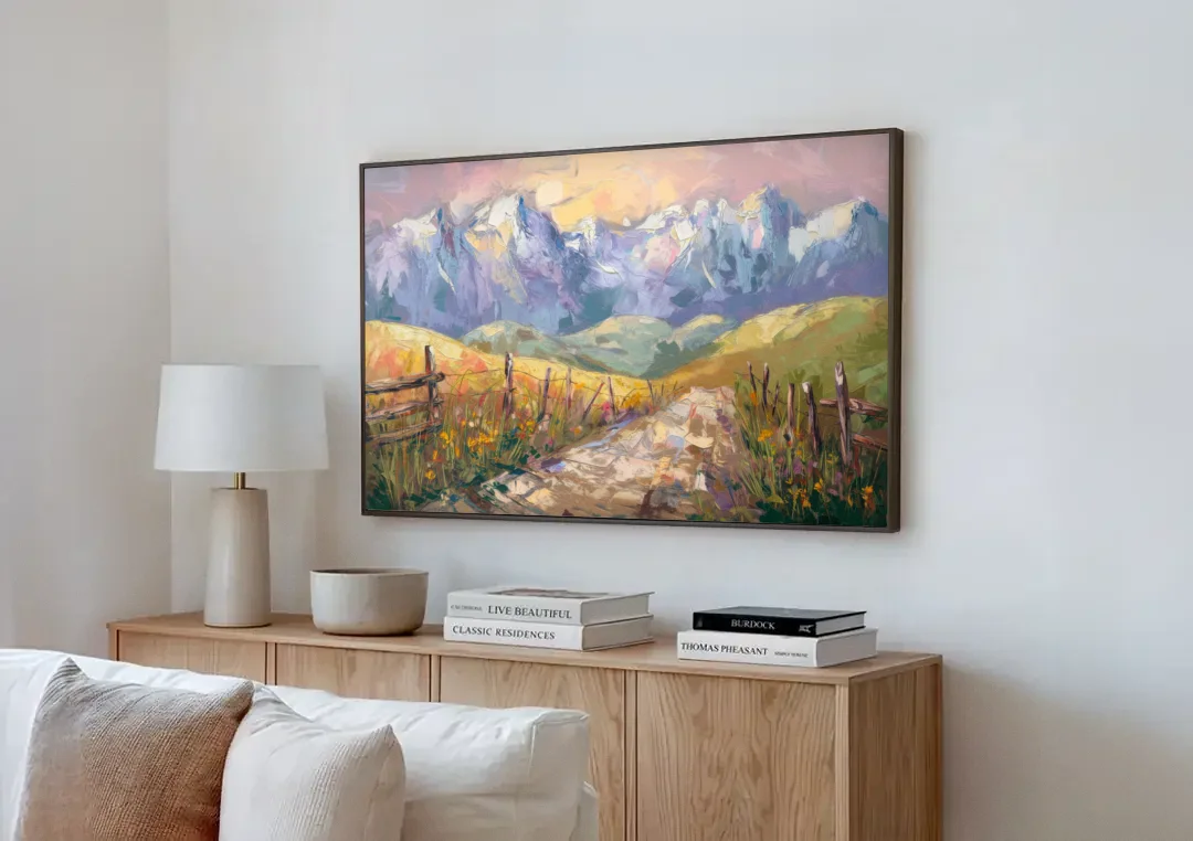 Bozeman Mountain Views canvas wall art above a wooden sideboard next to a sofa