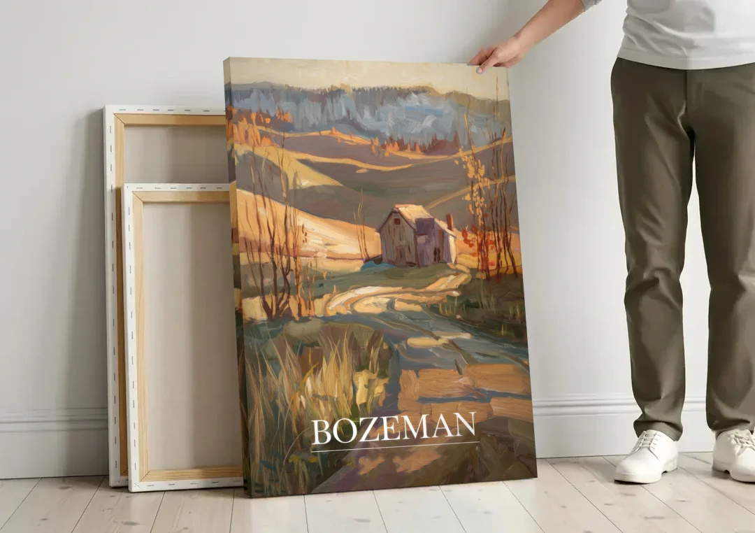 Bozeman Rustic Landscape canvas wall art leaning against a wall next to blank canvases