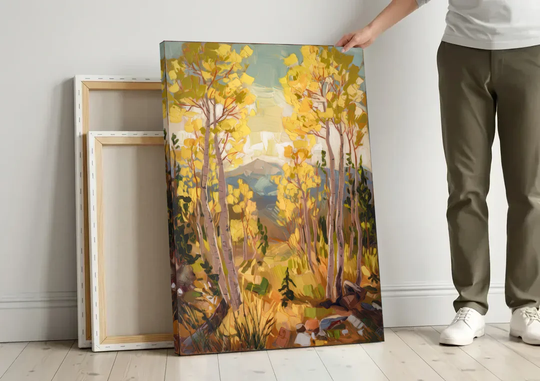 Breckenridge Aspen Forest canvas wall art leaning against a wall next to blank canvases