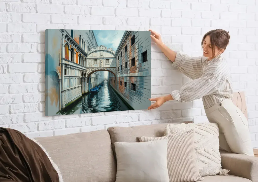 Bridge of Sighs Whisper canvas wall art being hung on a white brick wall above a sofa