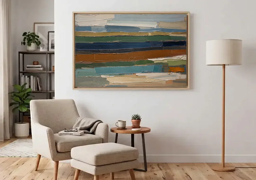 Brown Abstract Wall Art of Weathered Strata canvas wall art above an armchair in a bright living room