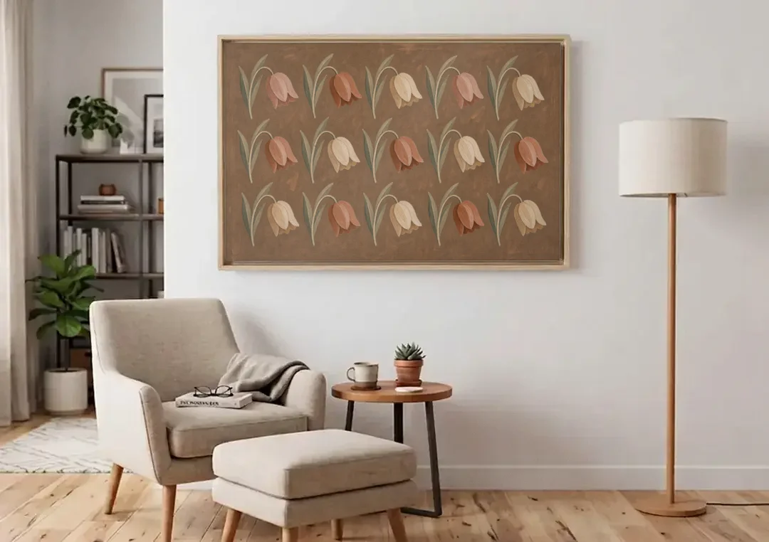 Brown Floral Wall Art with Nodding Tulip Rows canvas wall art above an armchair in a bright living room