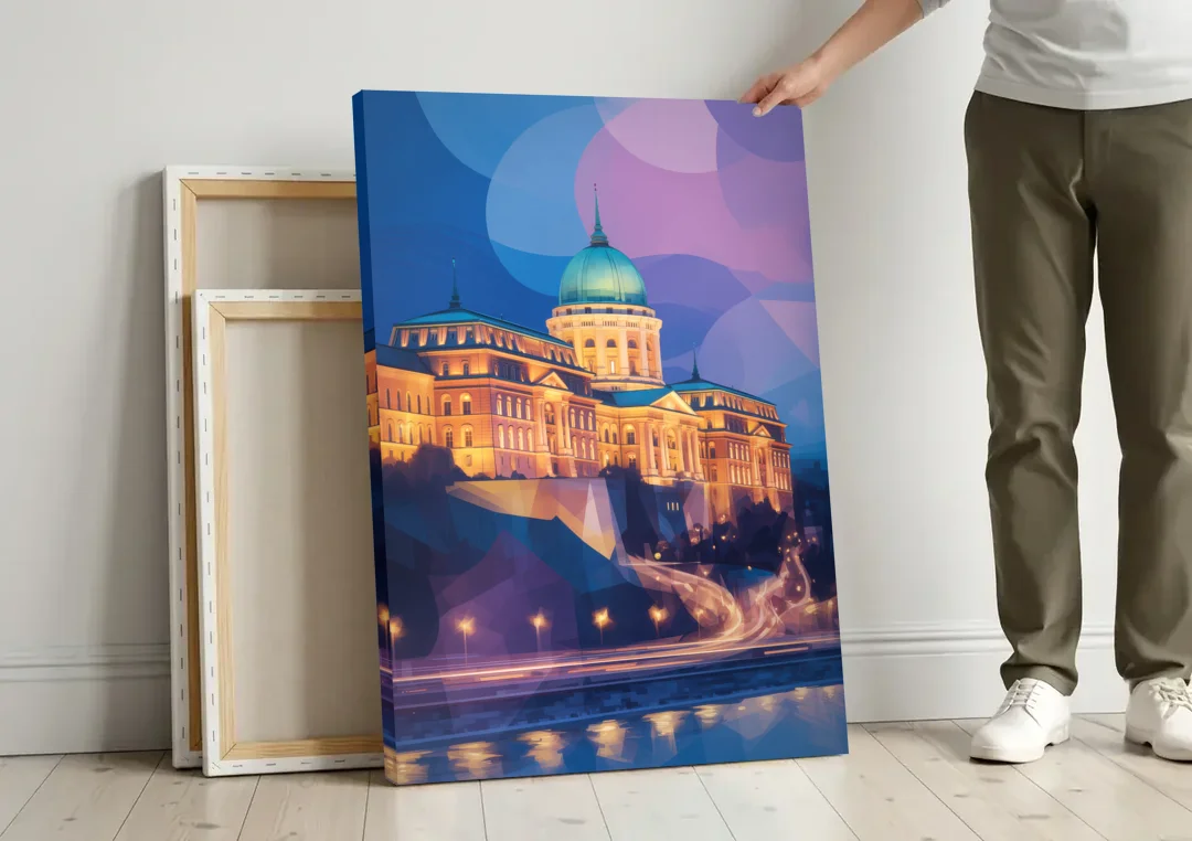 Buda Castle Glow canvas wall art leaning against a wall next to blank canvases