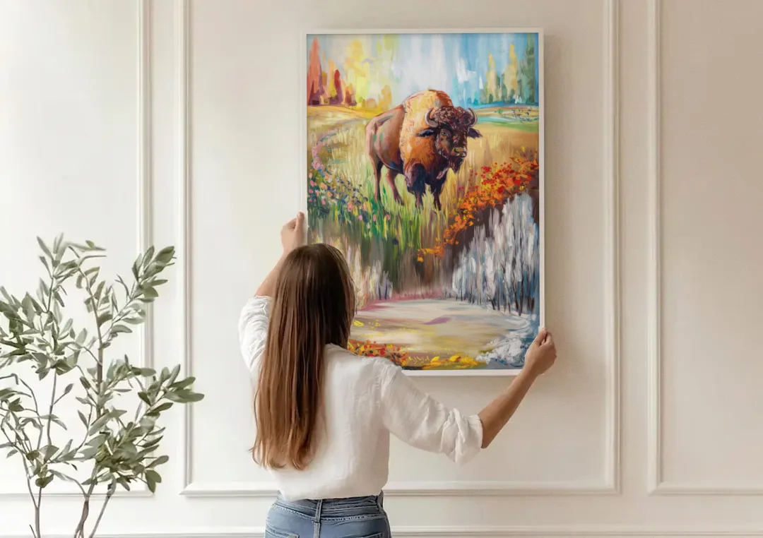 Buffalo All Seasons Beauty canvas wall art being hung on a paneled wall