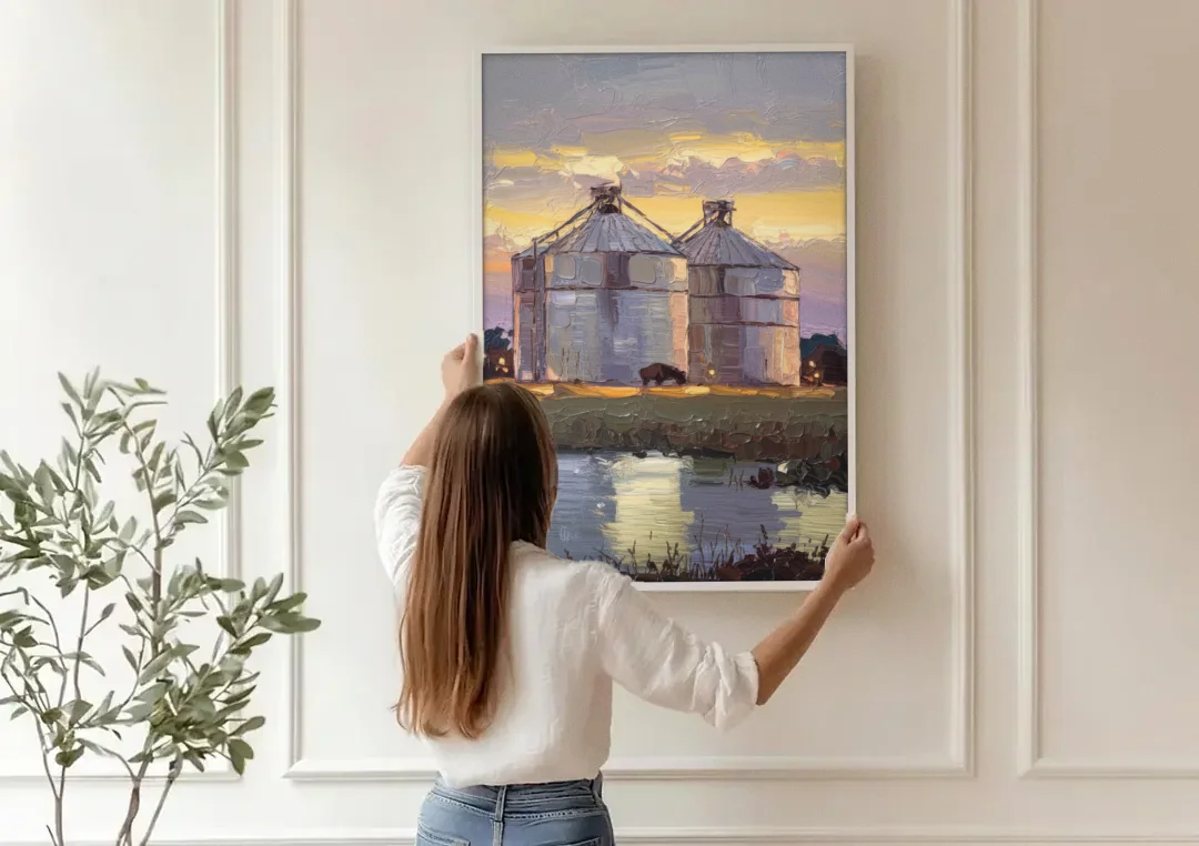 Buffalo Grain Silos at Dusk canvas wall art being hung on a paneled wall