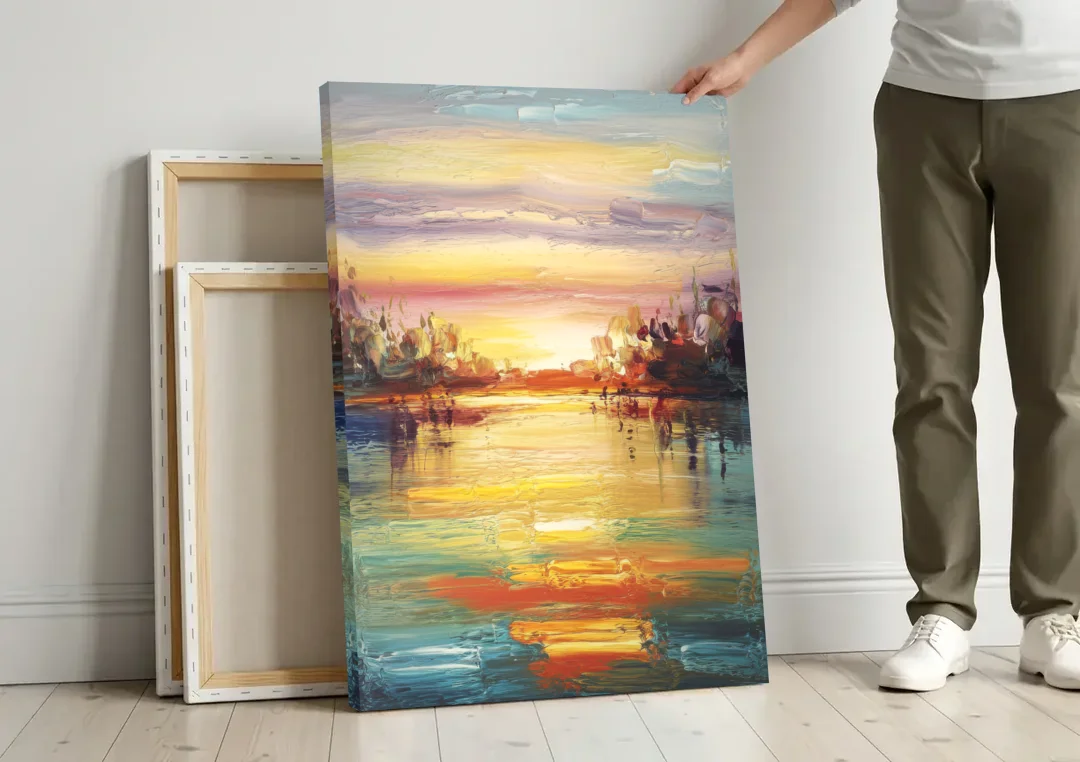 Buffalo Lake Erie Horizon canvas wall art leaning against a wall next to blank canvases