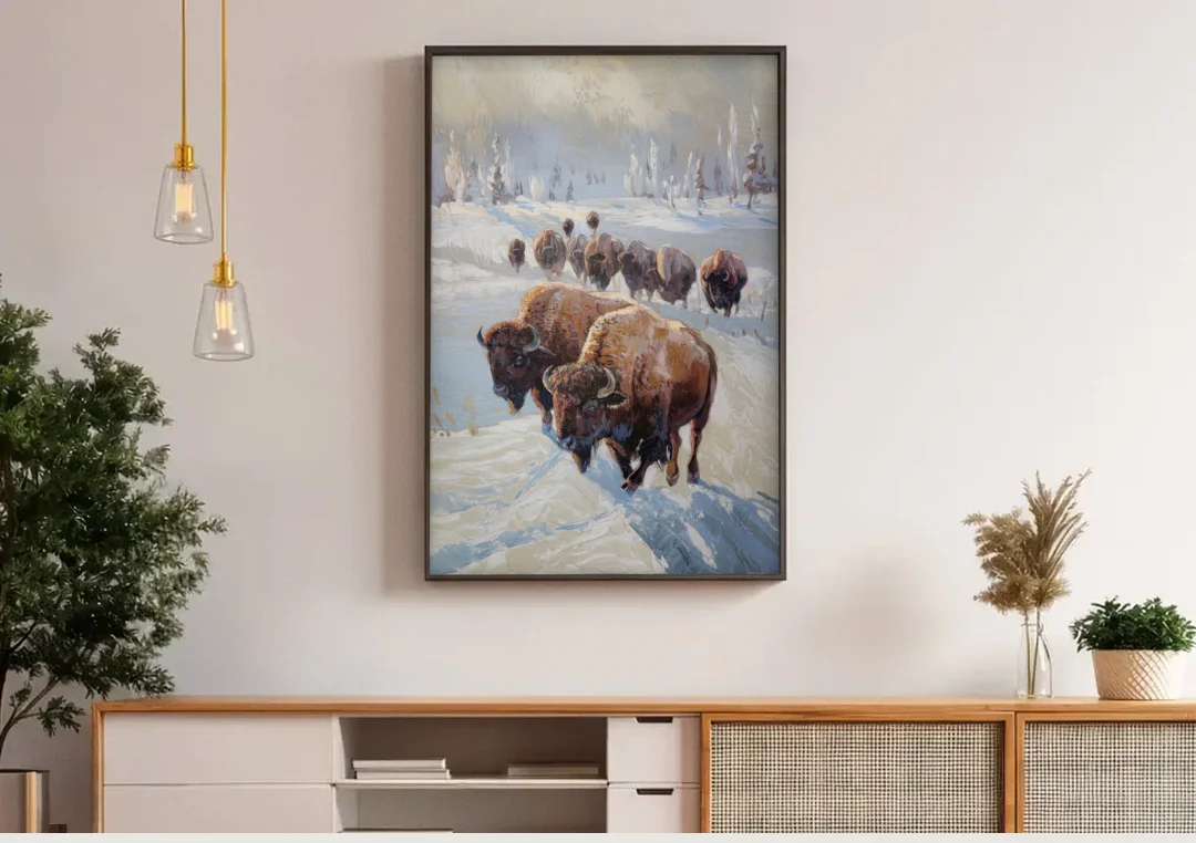 Buffalo Winter Wonderland canvas wall art above a wooden sideboard under pendant lights
