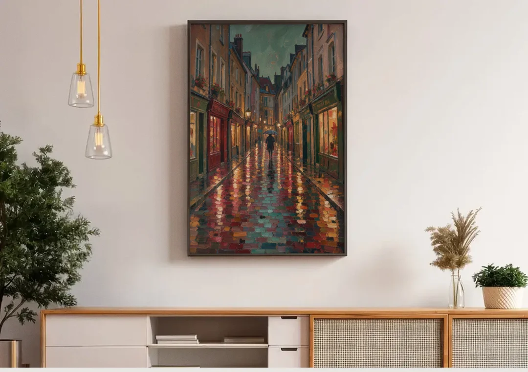 Burgundy Wall Decor of a Rainy Cobblestone Lane canvas wall art above a wooden sideboard under pendant lights