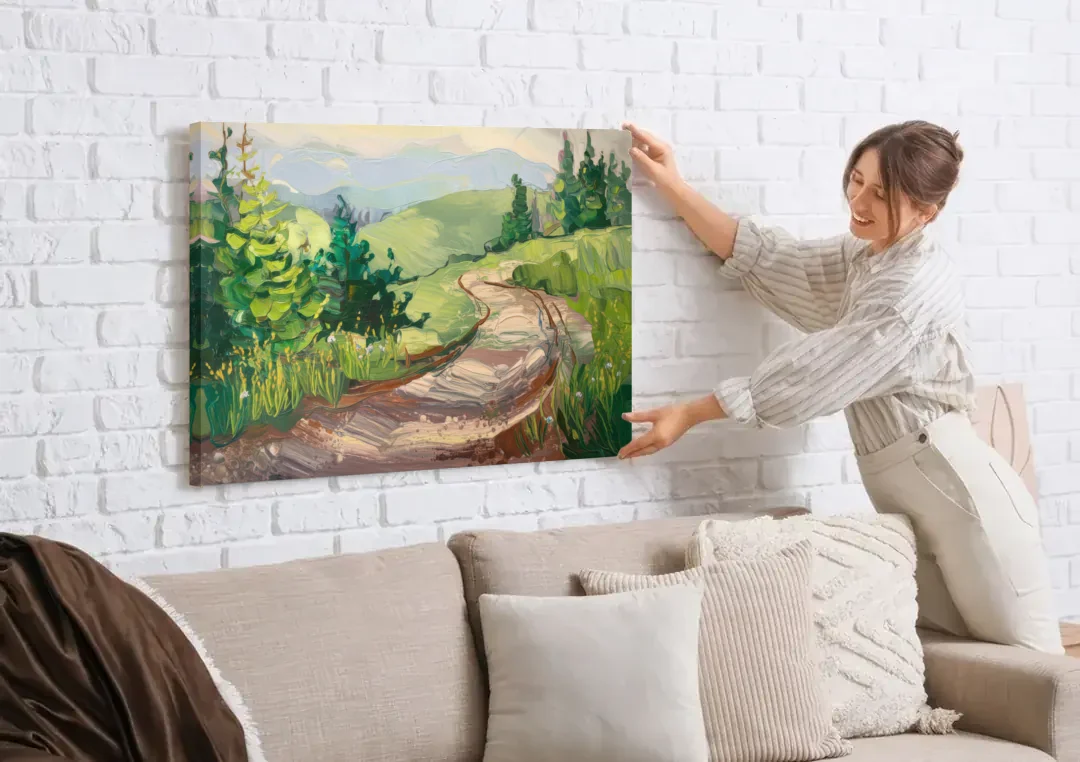 Burlington Green Mountain Trails canvas wall art being hung on a white brick wall above a sofa