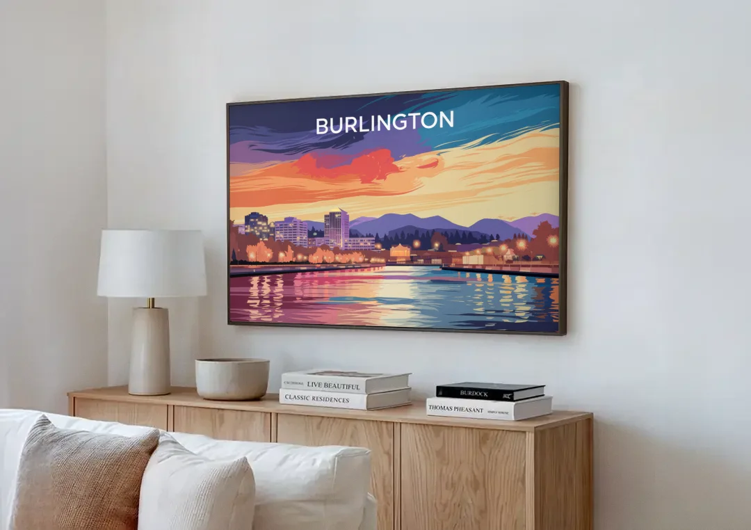 Burlington Skyline At Sunset canvas wall art above a wooden sideboard next to a sofa