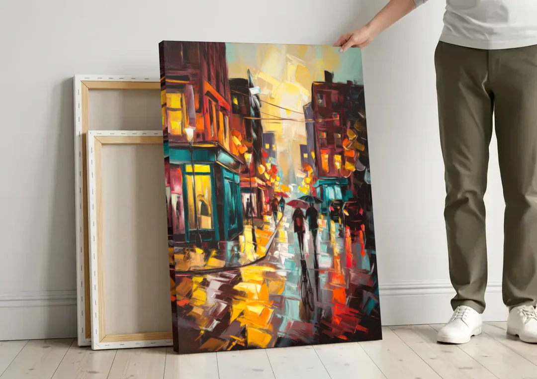 Burlington Urban Street Scenes canvas wall art leaning against a wall next to blank canvases