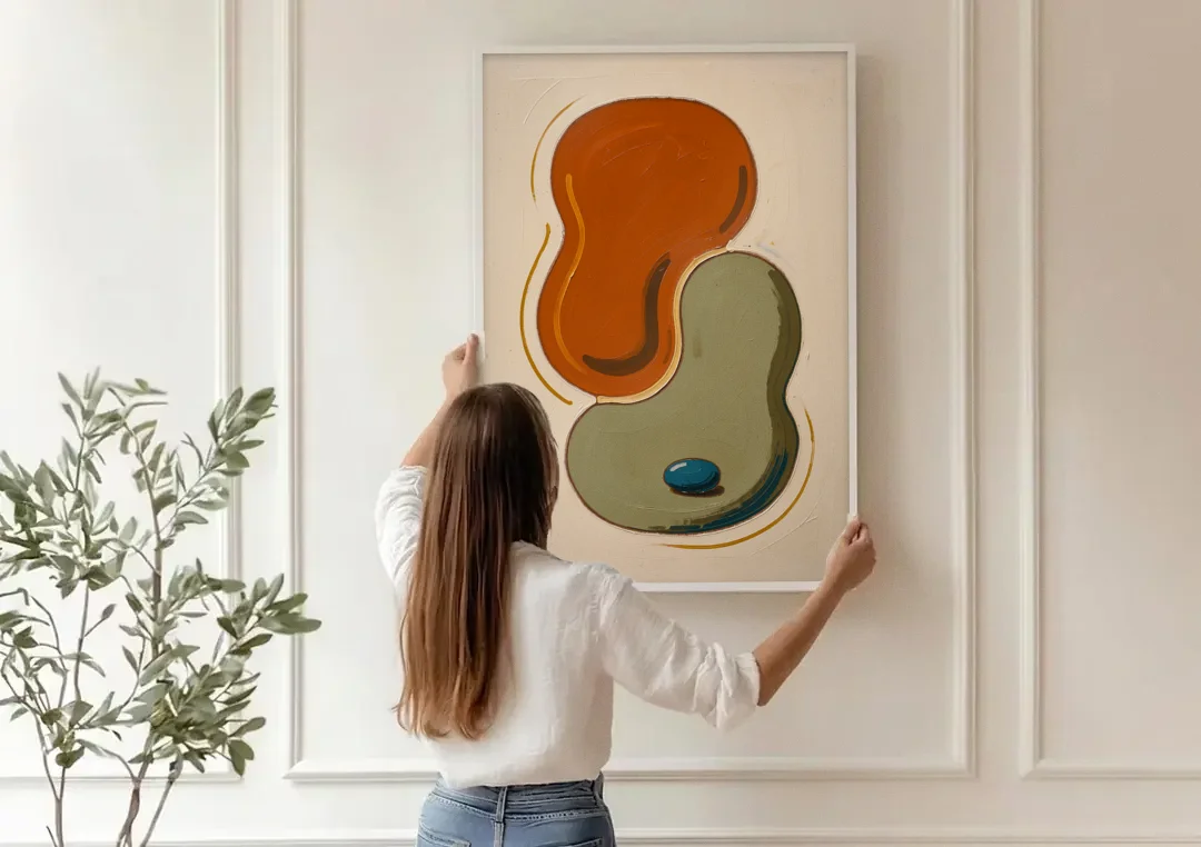 Burnt Orange Abstract Wall Art with Sage Interlock canvas wall art being hung on a paneled wall
