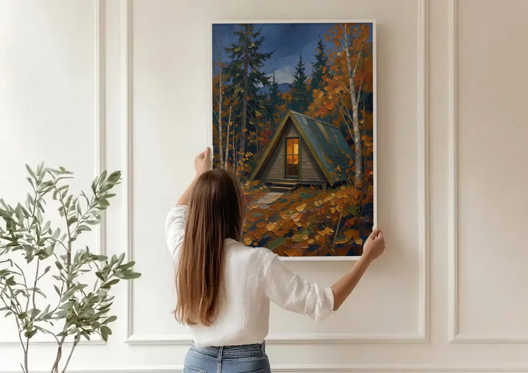 Cabin Wall Art with Amber Window at Autumn Dusk canvas wall art being hung on a paneled wall