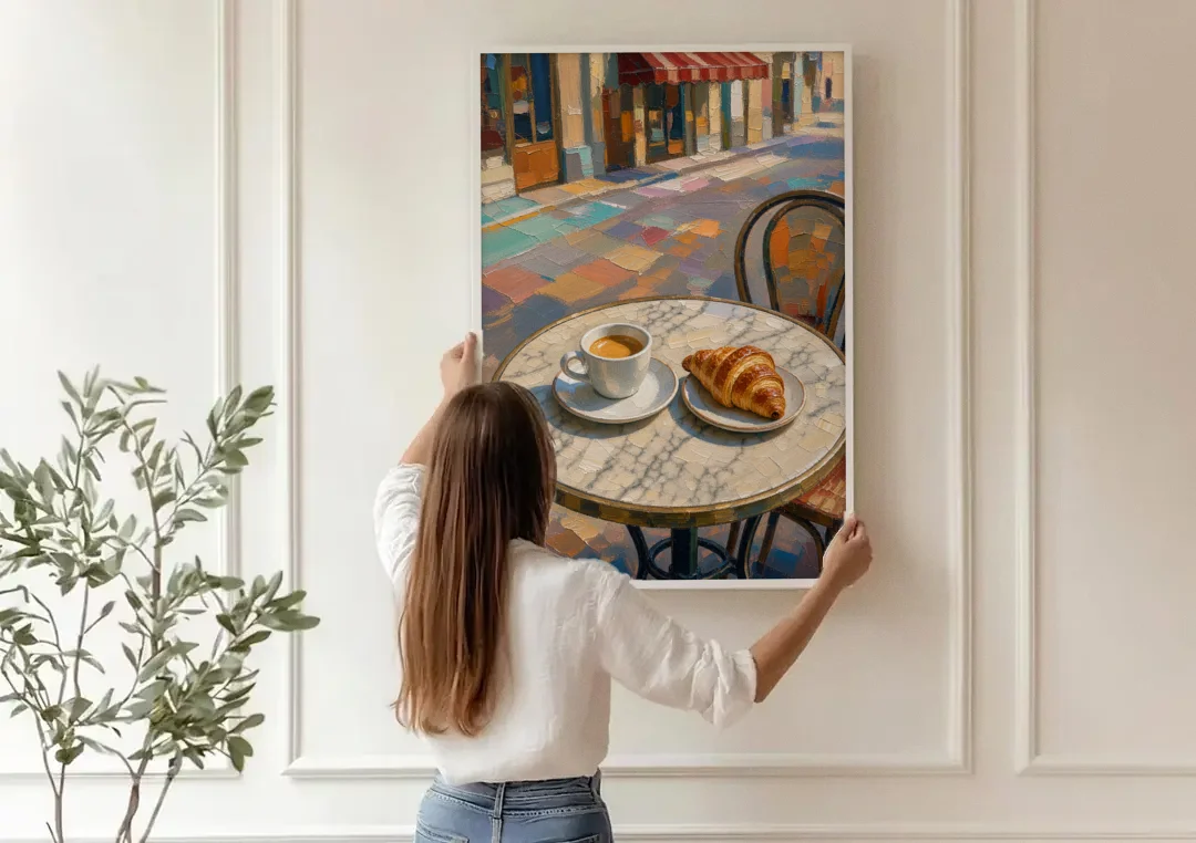 Cafe Wall Decor Espresso and Croissant on Marble canvas wall art being hung on a paneled wall