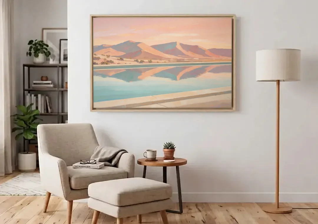 California Wall Art with Desert Mountains Mirrored in a Pool canvas wall art above an armchair in a bright living room
