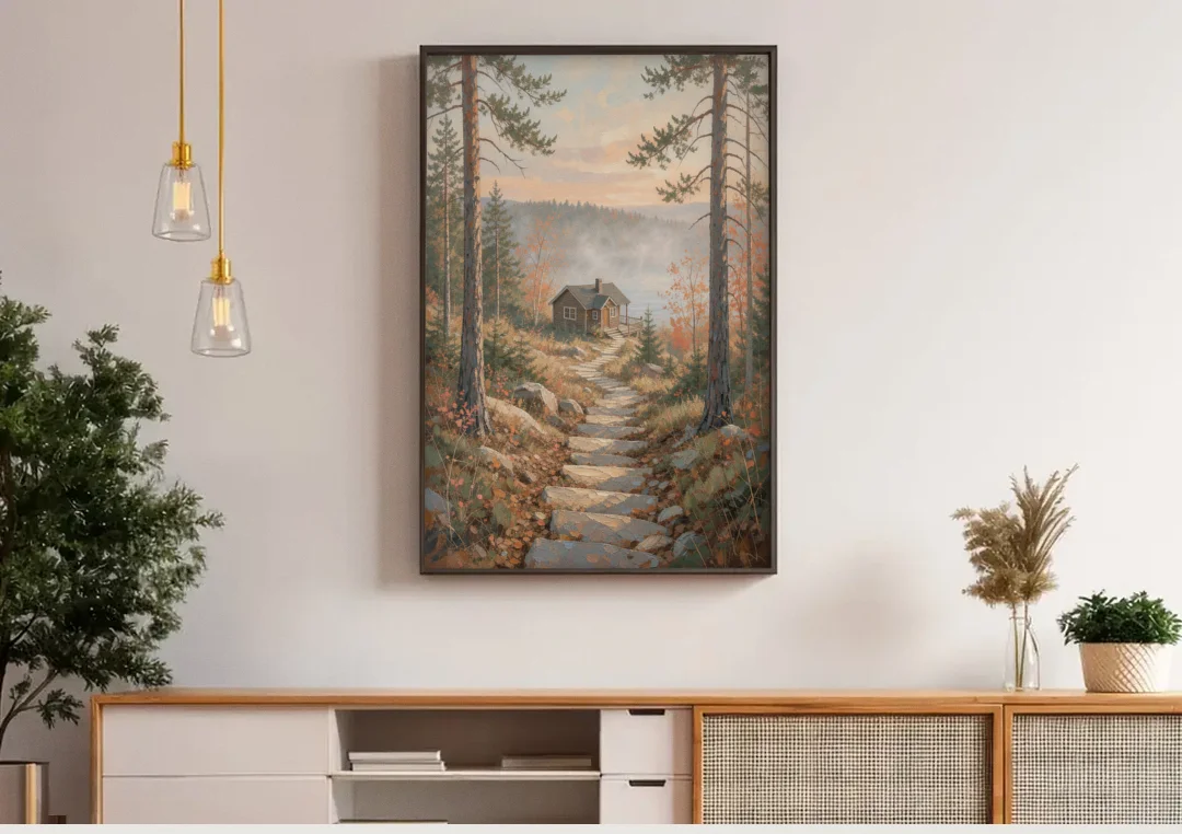 Calming Canvas Art of a Lakeside Cottage Path canvas wall art above a wooden sideboard under pendant lights