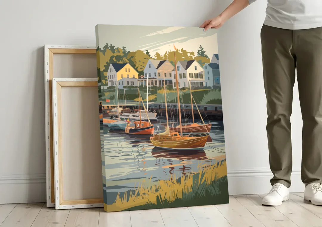 Camden Harbor Boats and Skyline canvas wall art leaning against a wall next to blank canvases