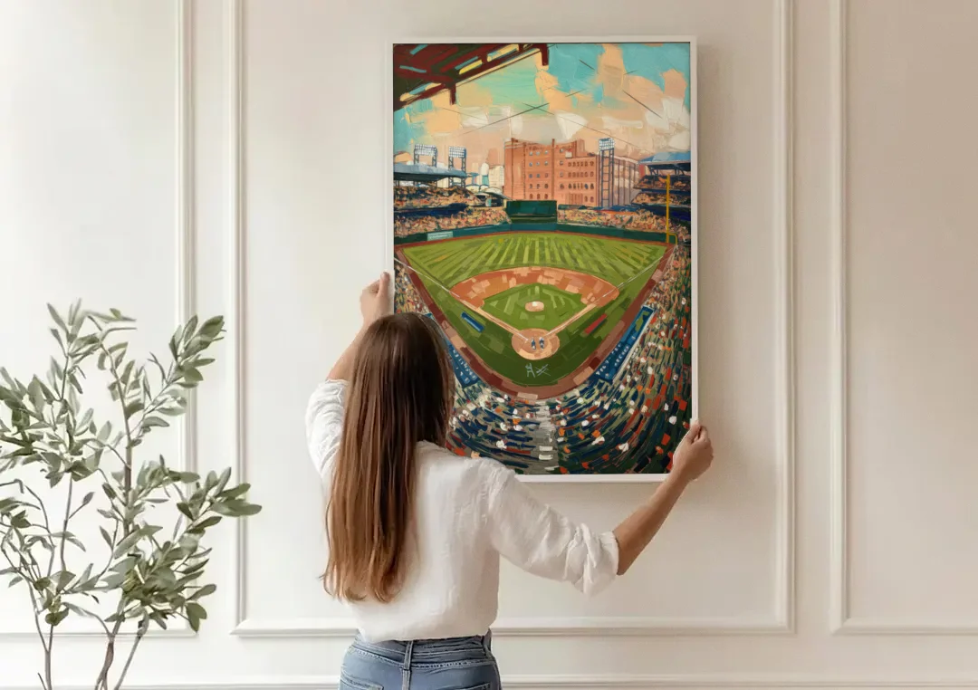 Camden Yards Orioles Tribute canvas wall art being hung on a paneled wall