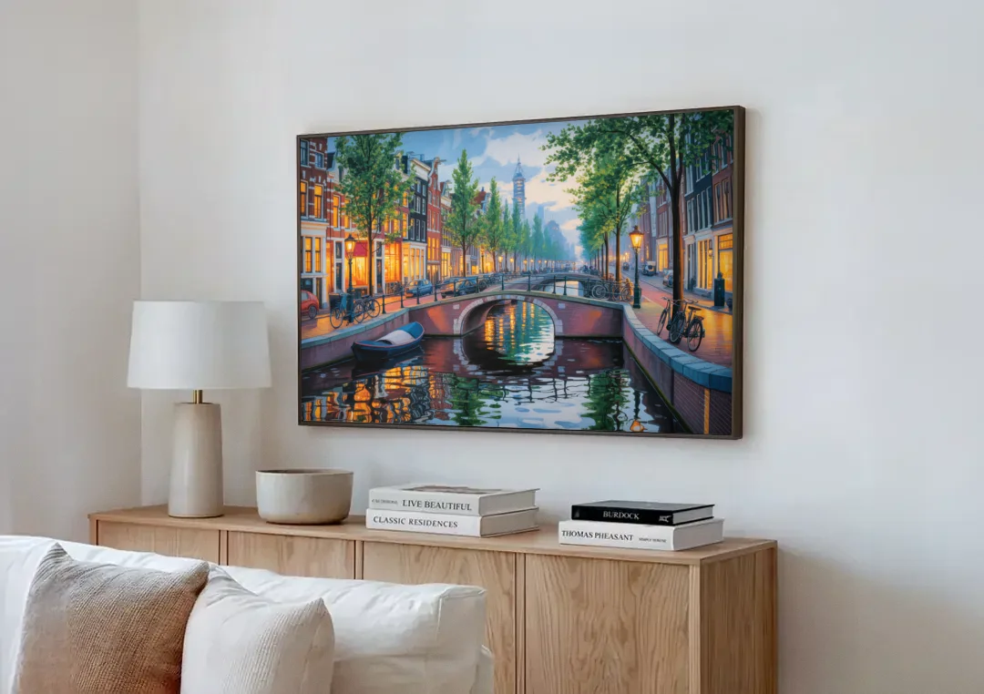 Canals of Amsterdam canvas wall art above a wooden sideboard next to a sofa