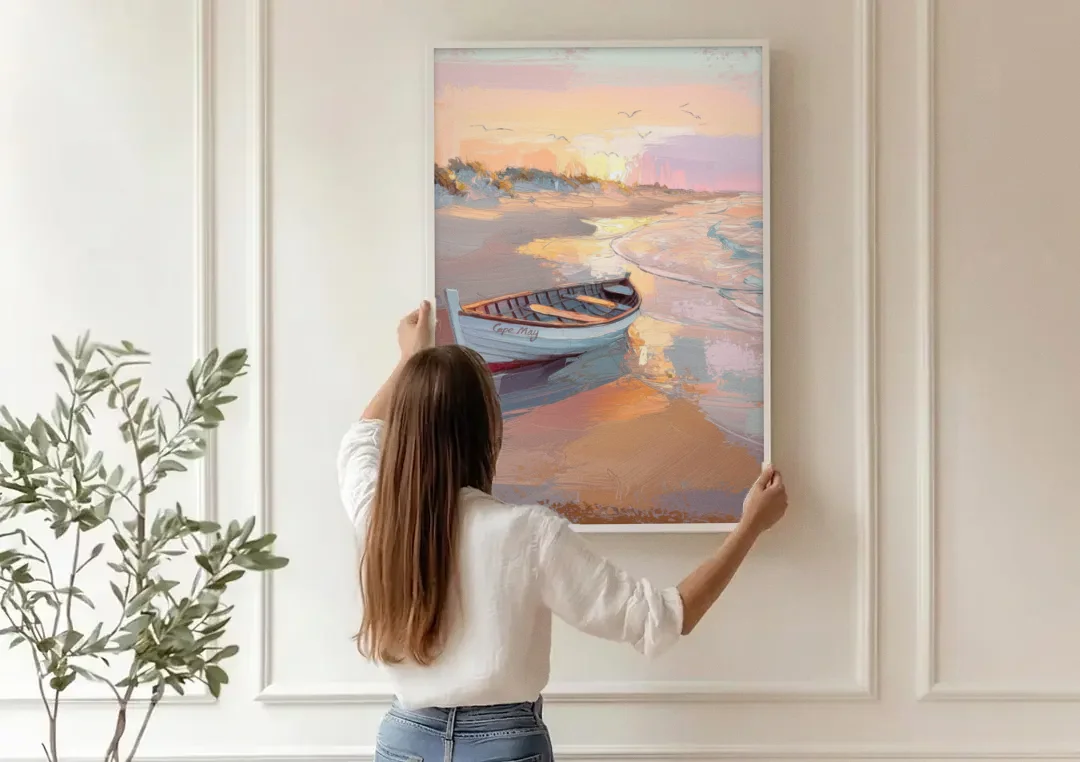 Cape May Beach Sunrise canvas wall art being hung on a paneled wall