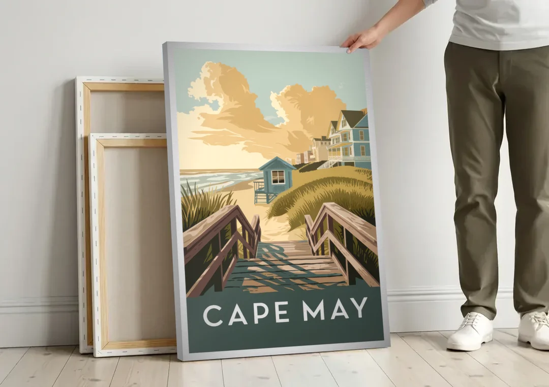 Cape May Boardwalk Views canvas wall art leaning against a wall next to blank canvases