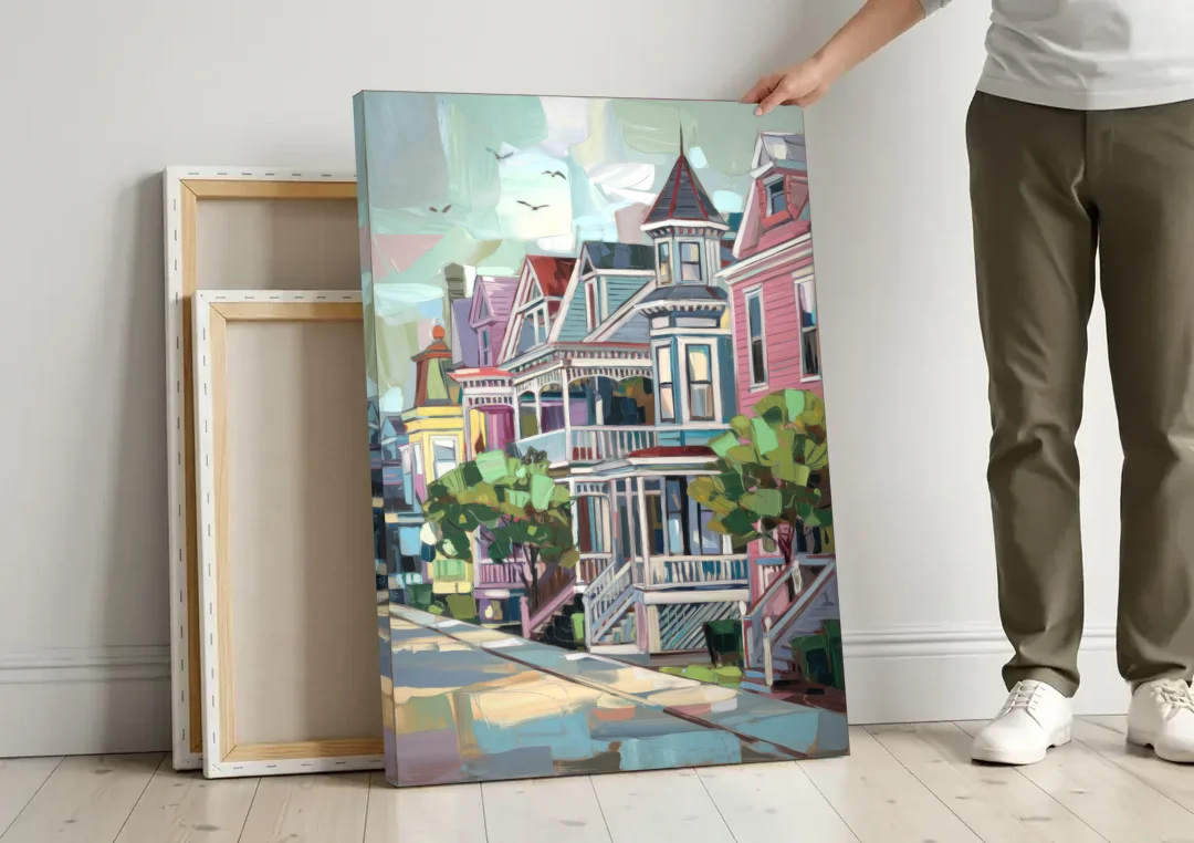 Cape May Historic District canvas wall art leaning against a wall next to blank canvases