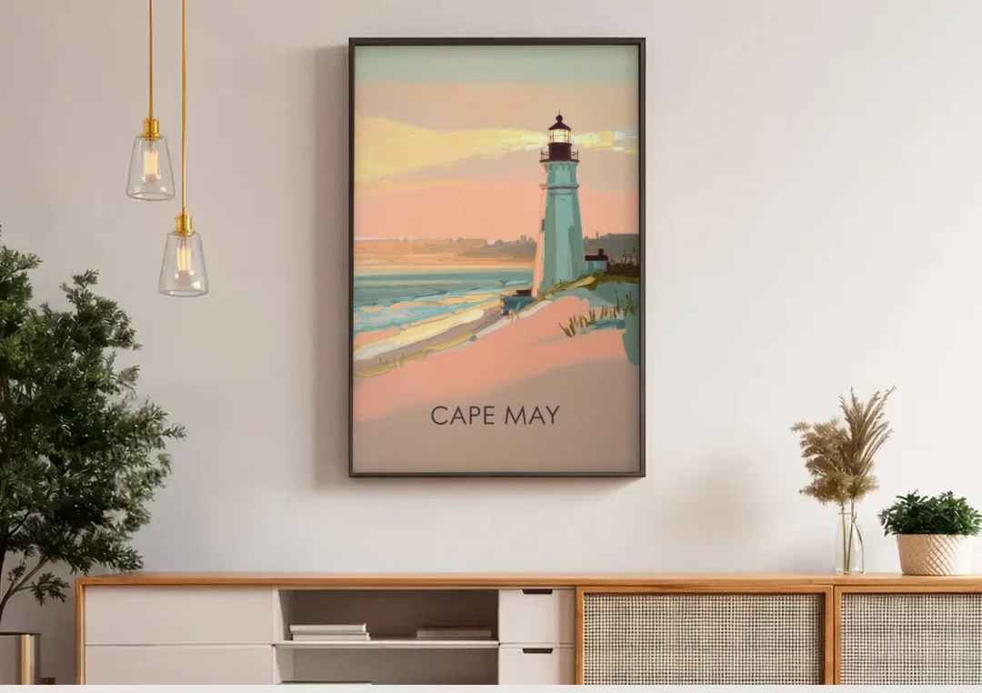 Cape May Lighthouse Glow canvas wall art above a wooden sideboard under pendant lights
