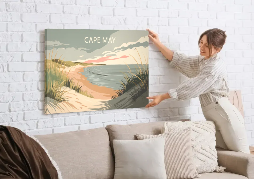 Cape May Ocean Breeze canvas wall art being hung on a white brick wall above a sofa