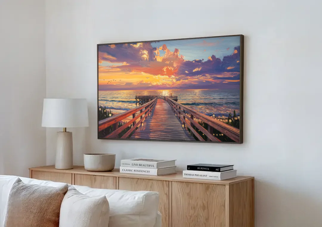 Cape May Sunset Pier canvas wall art above a wooden sideboard next to a sofa