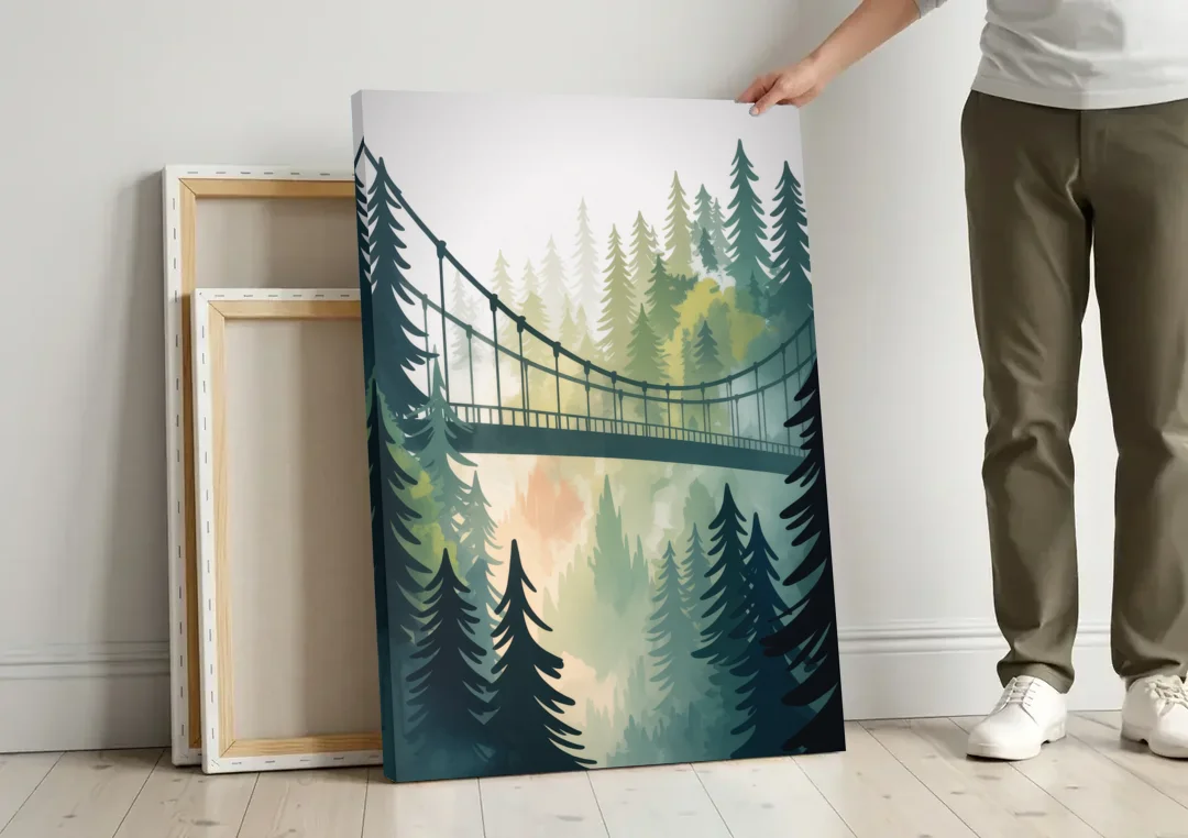 Capilano Suspension Bridge canvas wall art leaning against a wall next to blank canvases