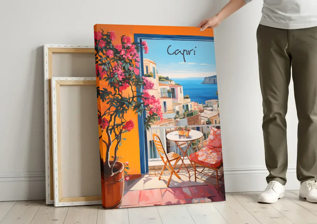 Capri Painting of a Bougainvillea Balcony canvas wall art leaning against a wall next to blank canvases