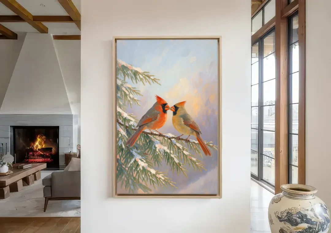 Winter Cardinal Pair Sharing a Seed canvas wall art in a living room with a fireplace