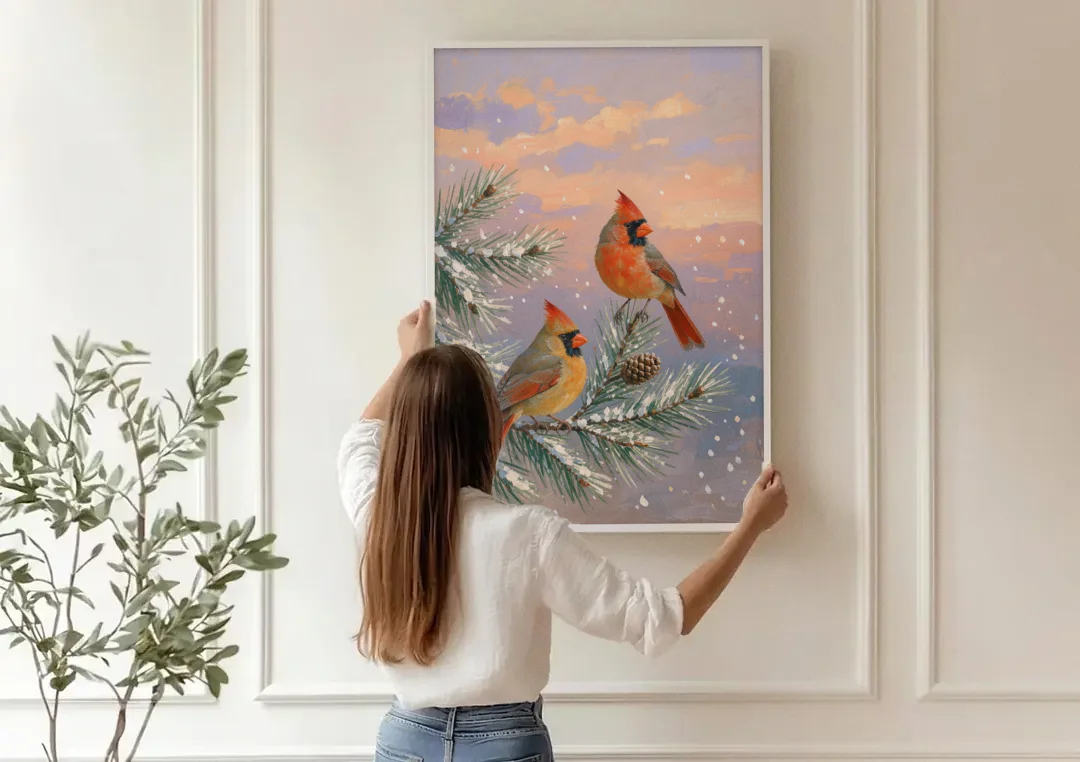Christmas Cardinal Pair with Pine Cone at Dusk canvas wall art being hung on a paneled wall