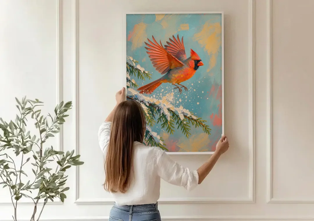 Cardinal Taking Flight from Snowy Hemlock canvas wall art being hung on a paneled wall
