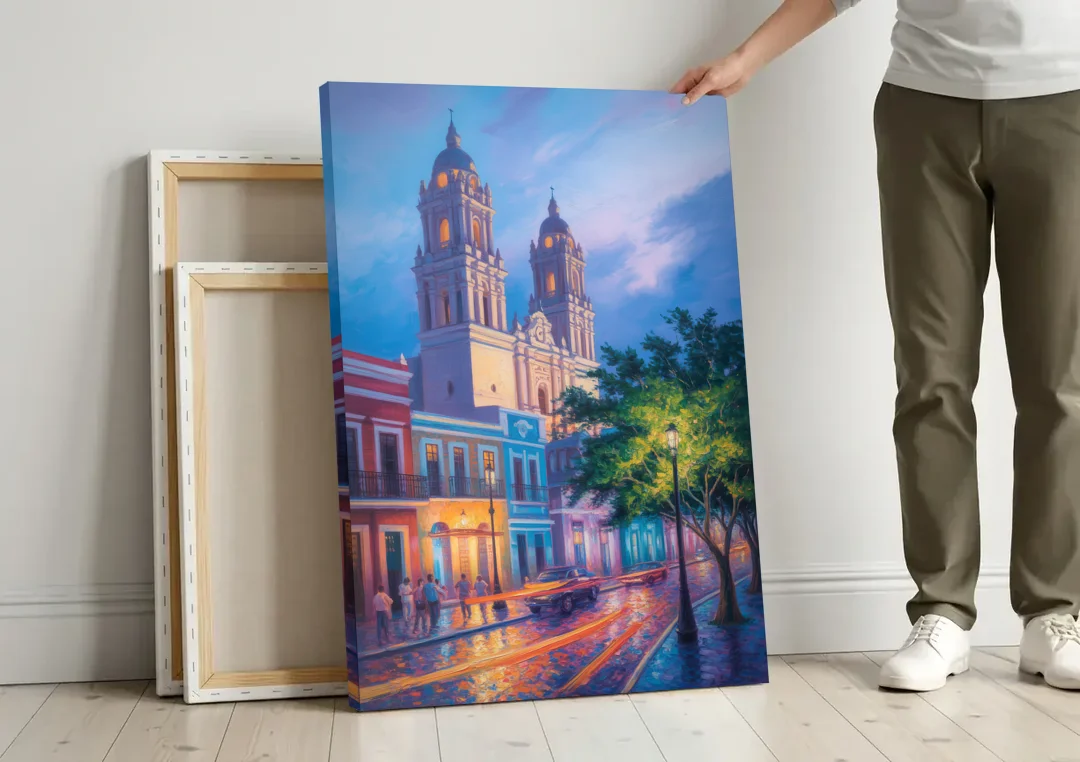 Cathedral of Campeche canvas wall art leaning against a wall next to blank canvases