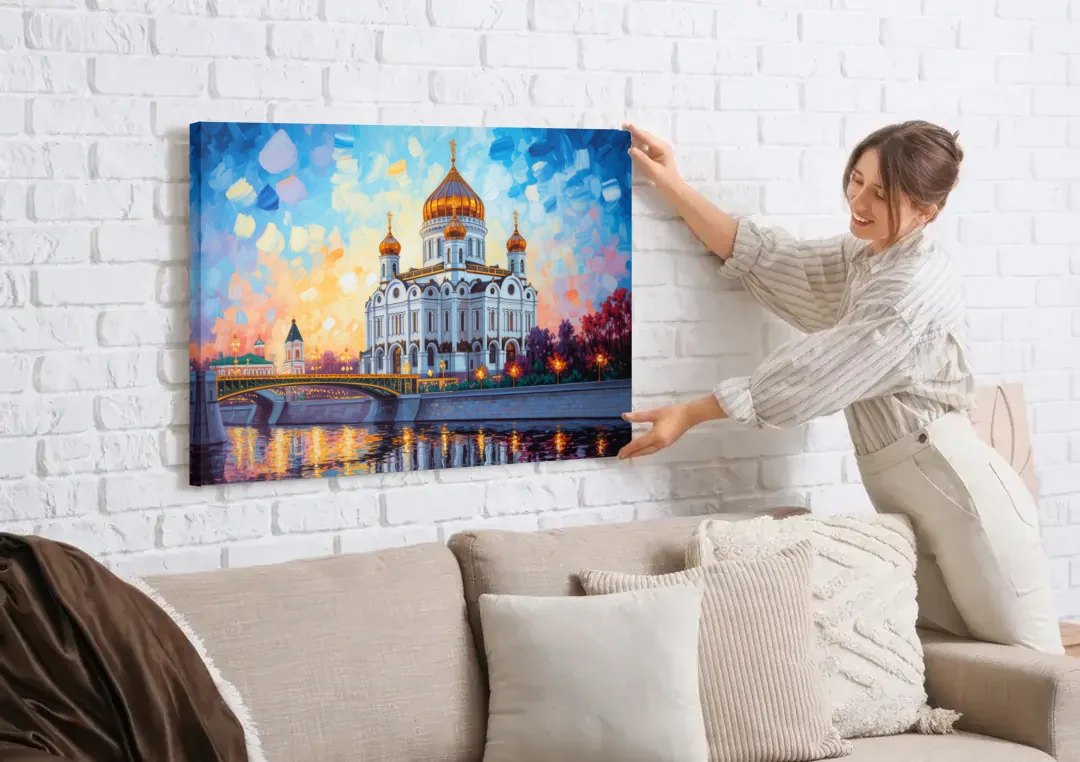 Cathedral of Christ Light canvas wall art being hung on a white brick wall above a sofa