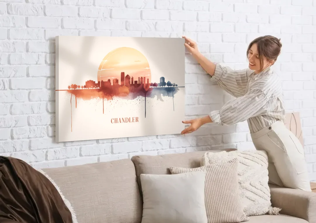 Chandler Skyline View canvas wall art being hung on a white brick wall above a sofa