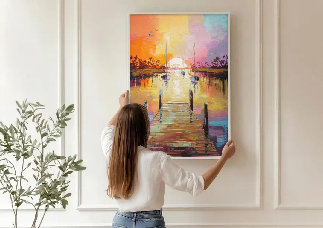 Charleston Harbor at Sunset canvas wall art being hung on a paneled wall