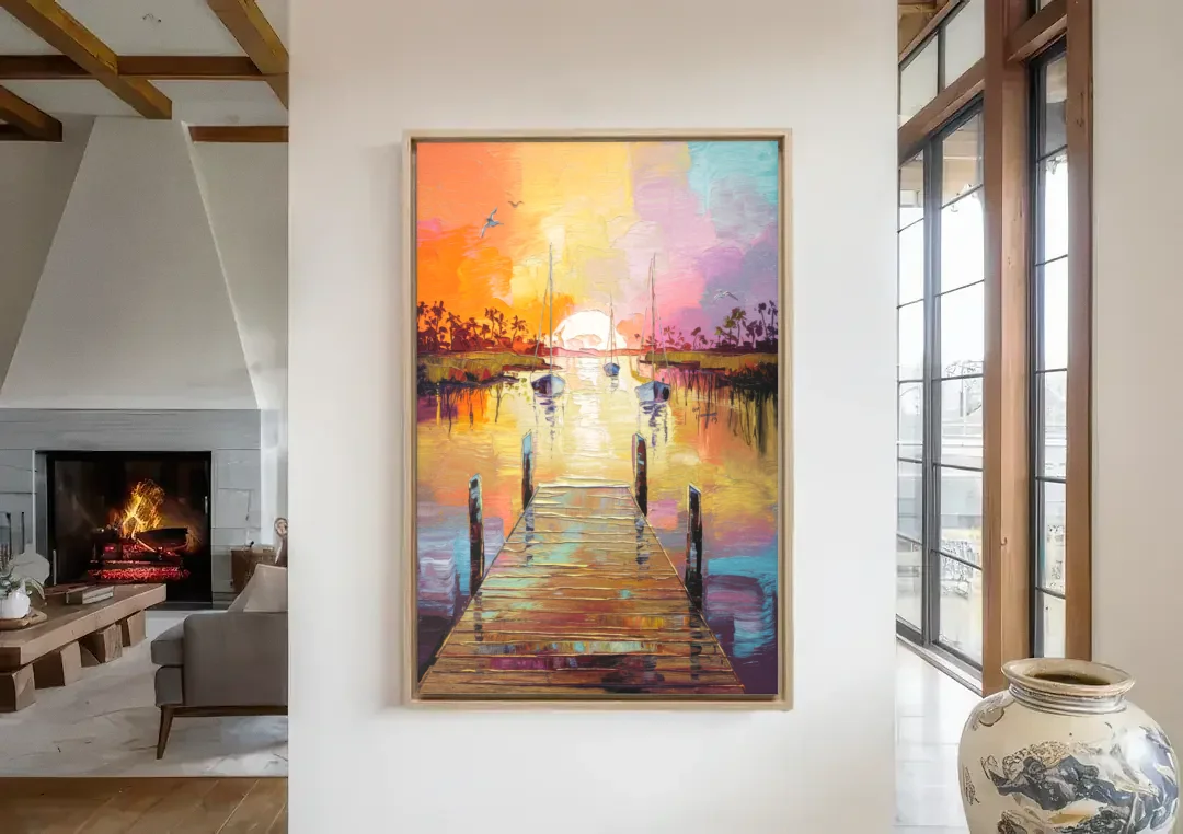 Charleston Harbor at Sunset canvas wall art in a living room with a fireplace