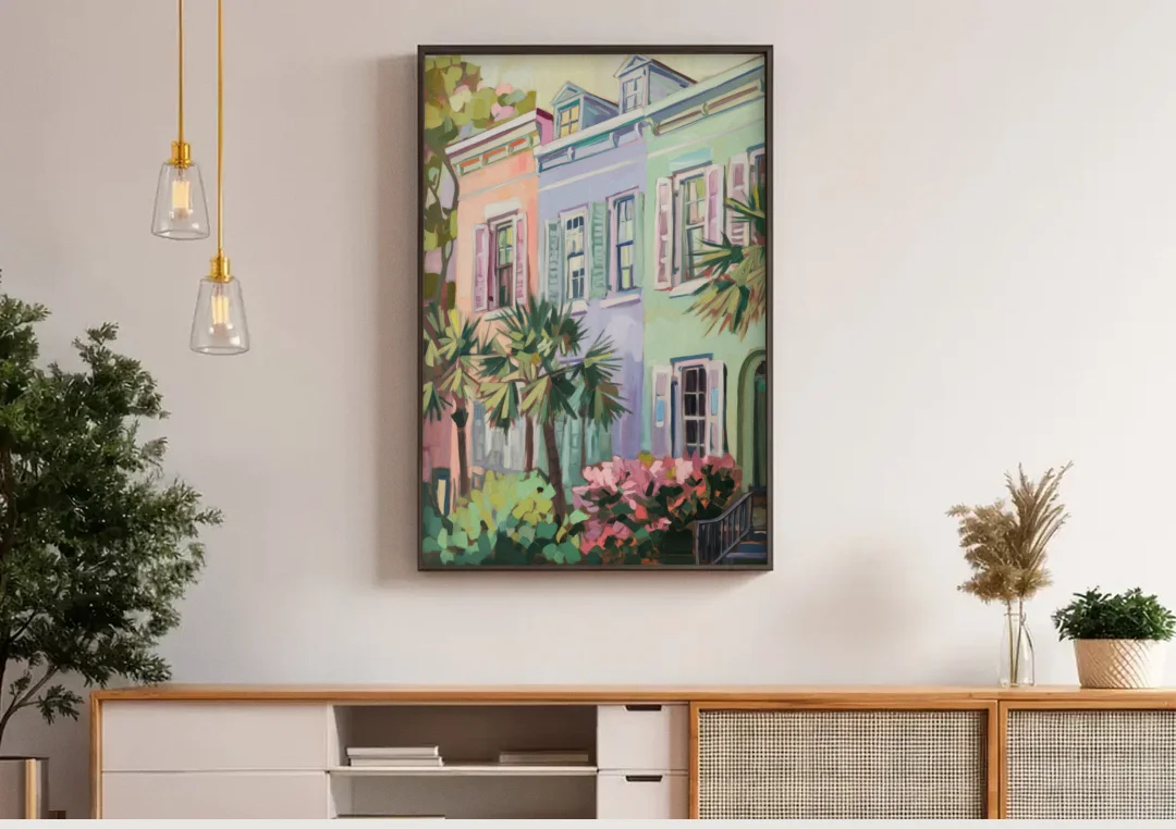 Charleston Rainbow Row canvas wall art above a wooden sideboard under pendant lights