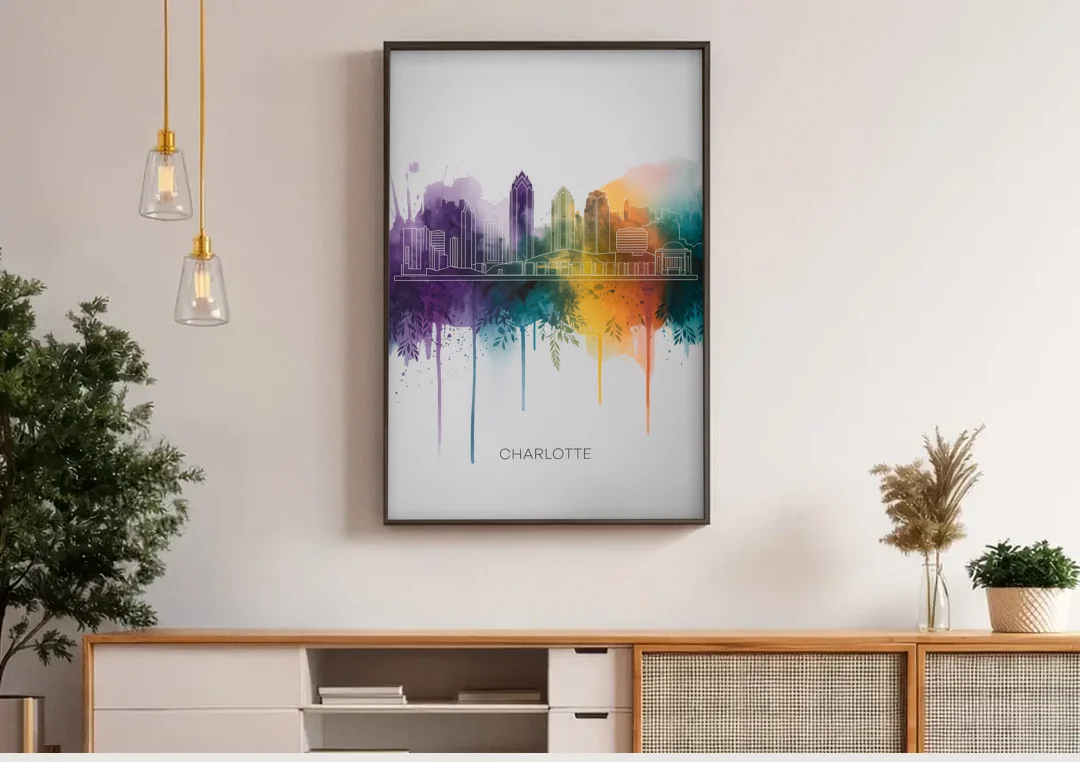 Charlotte Cityscape in Watercolor canvas wall art above a wooden sideboard under pendant lights