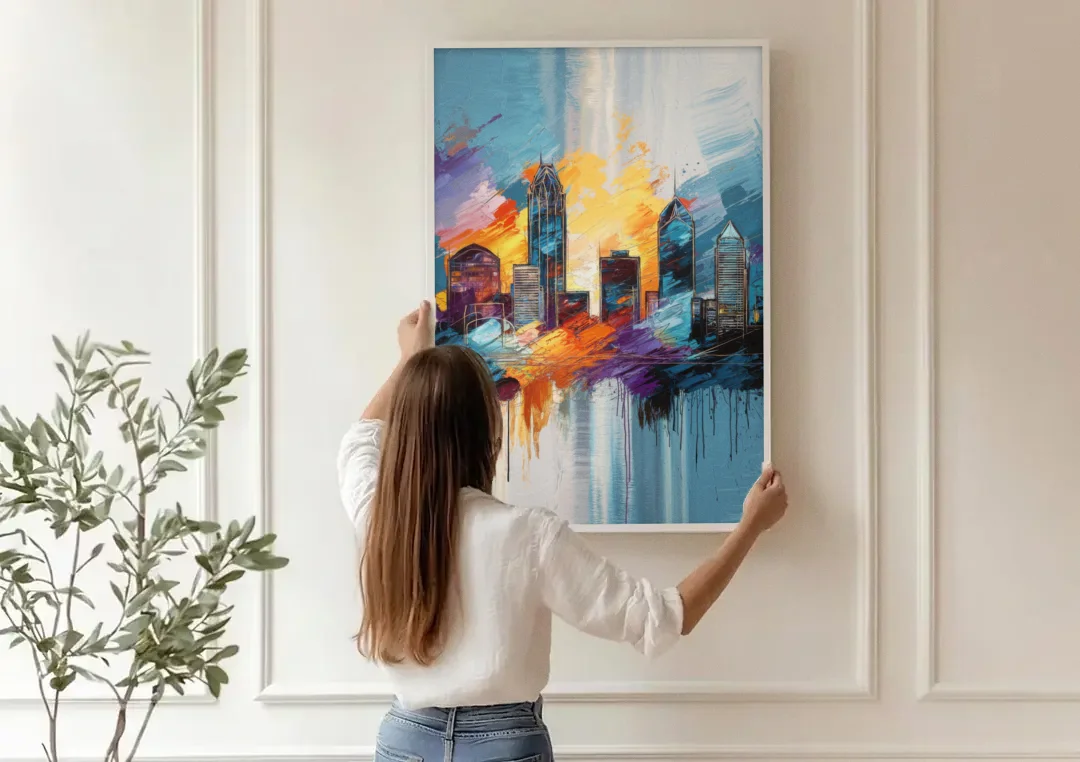 Charlotte Skyline and Panthers Pride canvas wall art being hung on a paneled wall