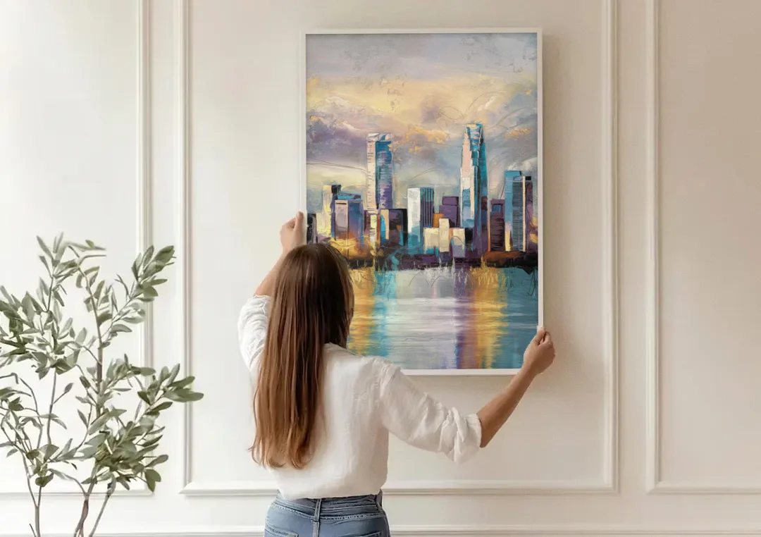 Charlotte Uptown Skyline canvas wall art being hung on a paneled wall