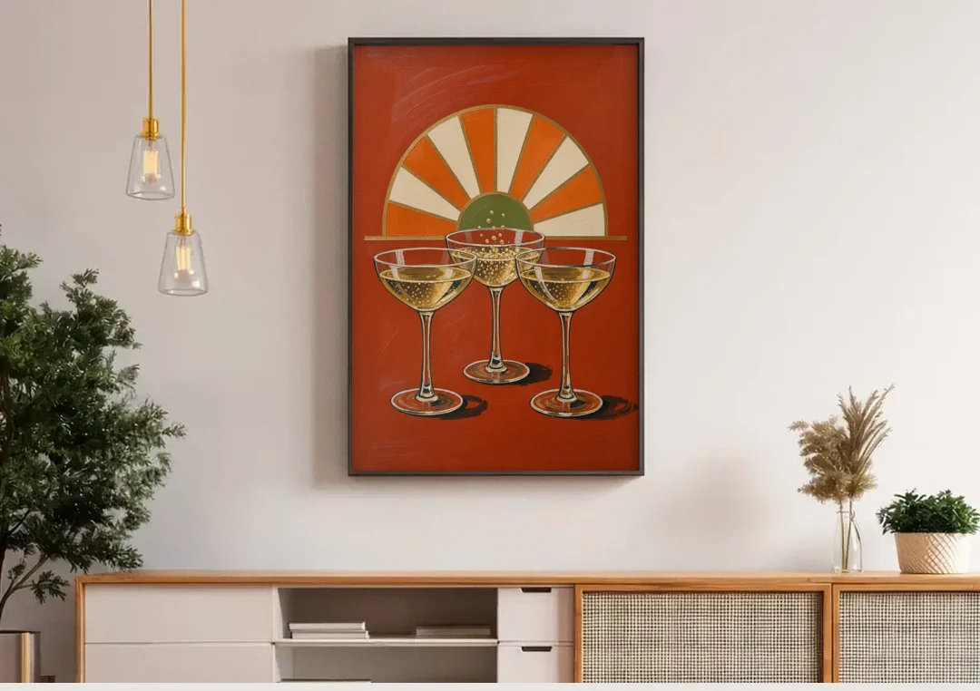 Cheers Wall Art with Three Champagne Coupes canvas wall art above a wooden sideboard under pendant lights