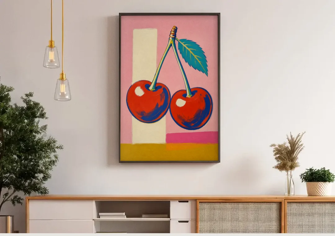 Cherries Painting with a Teal Leaf canvas wall art above a wooden sideboard under pendant lights