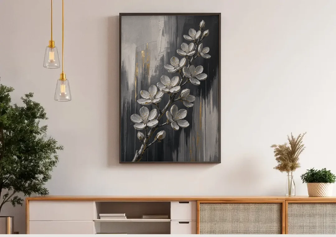 Cherry Blossom Branch Art in Charcoal and Gold canvas wall art above a wooden sideboard under pendant lights
