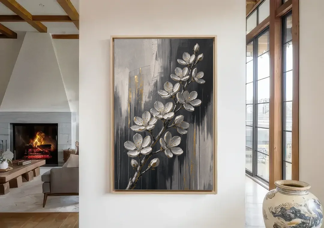 Cherry Blossom Branch Art in Charcoal and Gold canvas wall art in a living room with a fireplace